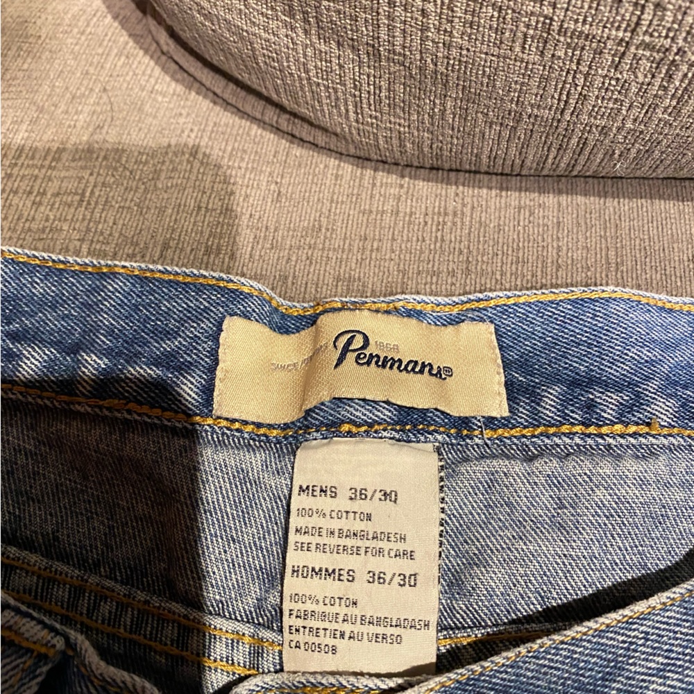 Penmans curt off jeans.